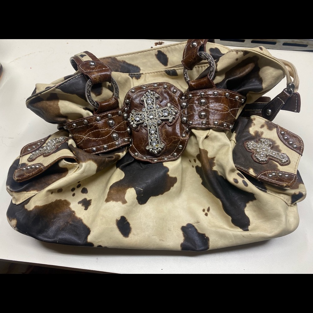 Cowprint leather bag
